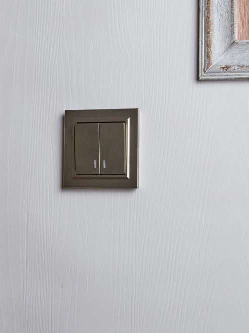 Выключатель 2-кл. СП BRITE ВС10-2-1-БрШ 10А с инд. шампань IEK BR-V20-1-10-K37 BR-V20-1-10-K37